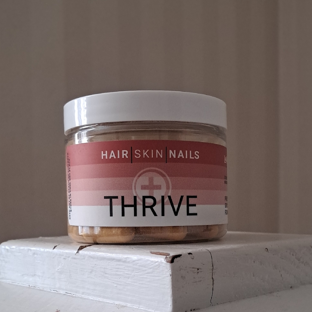Thrive Hair Skin Nails Supplement - Pink and White Jar